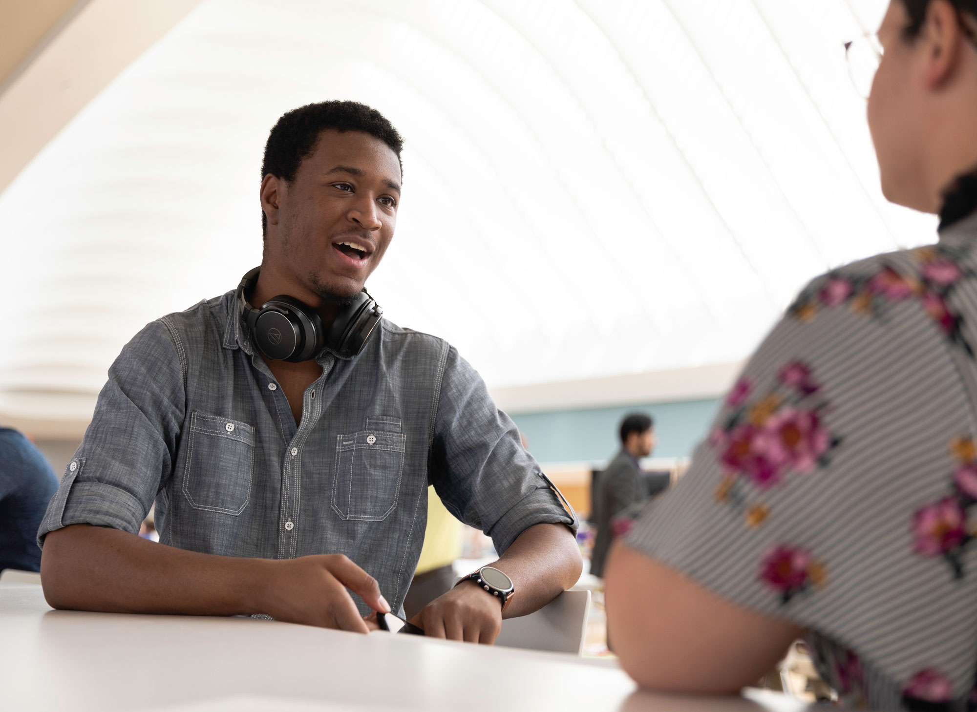 male student talking to female
